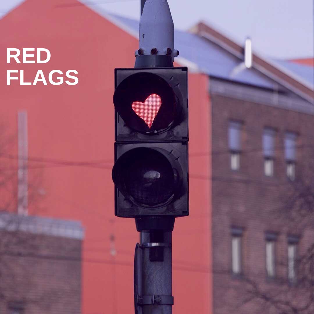 red stop light with a heart in it